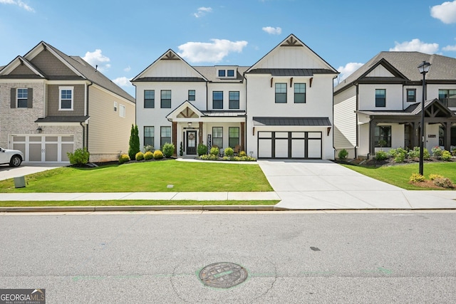 4189 Brookmont Way, Auburn, GA 30011 - townhome / multi-family property featuring a standing seam roof, concrete driveway, a garage, a front yard, and board and batten siding
