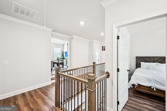 4189 Brookmont Way, Auburn, GA 30011 - hall with an upstairs landing, dark wood-type flooring, ornamental molding, and recessed lighting