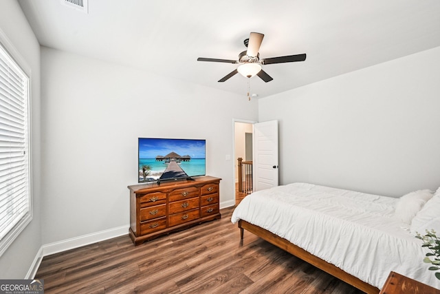 4189 Brookmont Way, Auburn, GA 30011 - bedroom with wood finished floors, multiple windows, and ceiling fan
