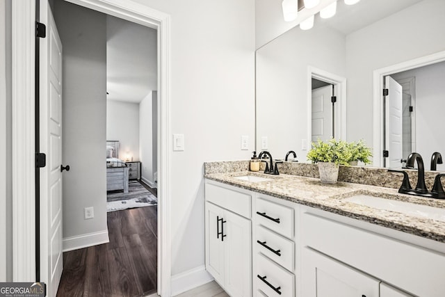 4189 Brookmont Way, Auburn, GA 30011 - full bath with double vanity, wood finished floors, and ensuite bathroom