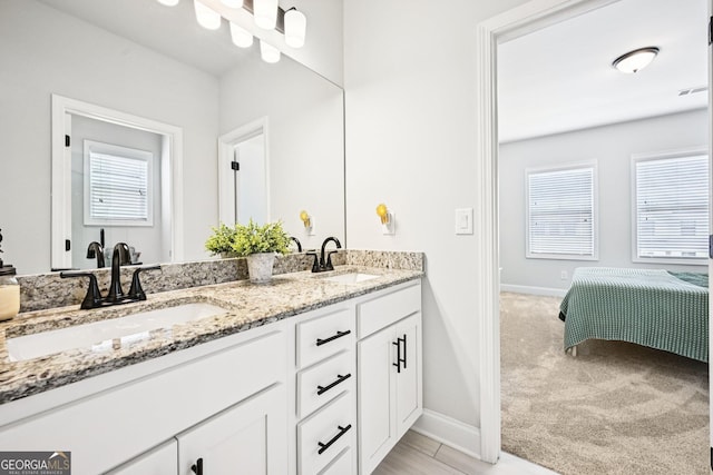 4189 Brookmont Way, Auburn, GA 30011 - ensuite bathroom featuring double vanity and baseboards