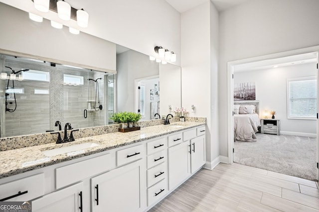 4189 Brookmont Way, Auburn, GA 30011 - full bathroom with a stall shower, double vanity, and ensuite bath