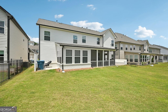 4189 Brookmont Way, Auburn, GA 30011 - back of property featuring a sunroom, a residential view, and a patio area