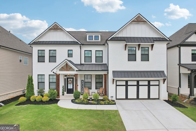 4189 Brookmont Way, Auburn, GA 30011 - view of front facade with a standing seam roof, board and batten siding, and concrete driveway