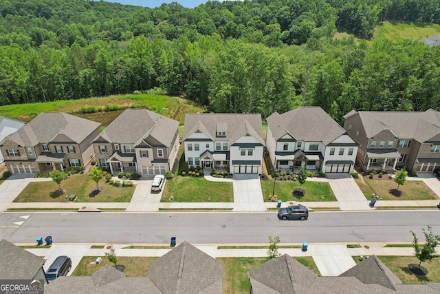 4189 Brookmont Way, Auburn, GA 30011 - aerial perspective of suburban area featuring a forest