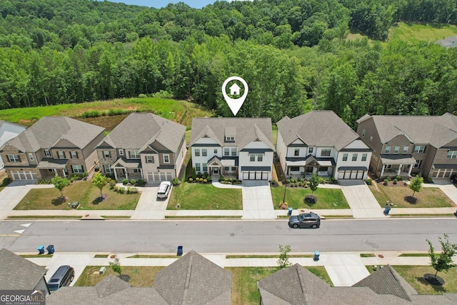 4189 Brookmont Way, Auburn, GA 30011 - aerial perspective of suburban area with a heavily wooded area