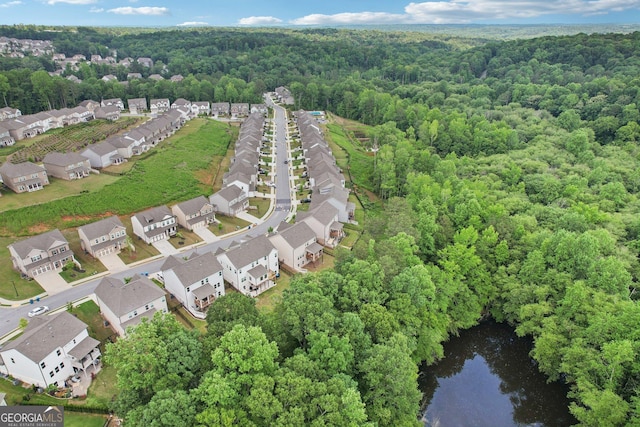 4189 Brookmont Way, Auburn, GA 30011 - aerial perspective of suburban area featuring a heavily wooded area and a large body of water