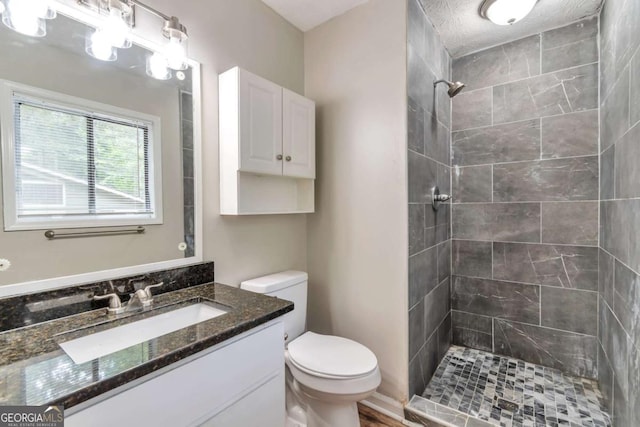 5215 Mainstreet Park Dr, Stone Mountain, GA 30088 - full bathroom with tiled shower and vanity