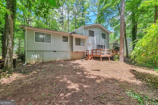 5215 Mainstreet Park Dr, Stone Mountain, GA 30088 - back of property featuring crawl space and a deck
