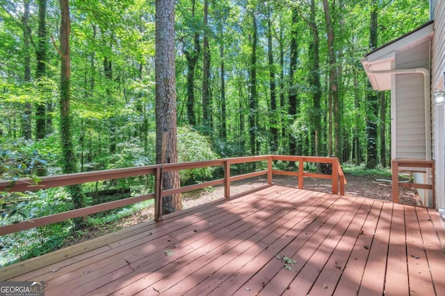 5215 Mainstreet Park Dr, Stone Mountain, GA 30088 - deck featuring a view of trees