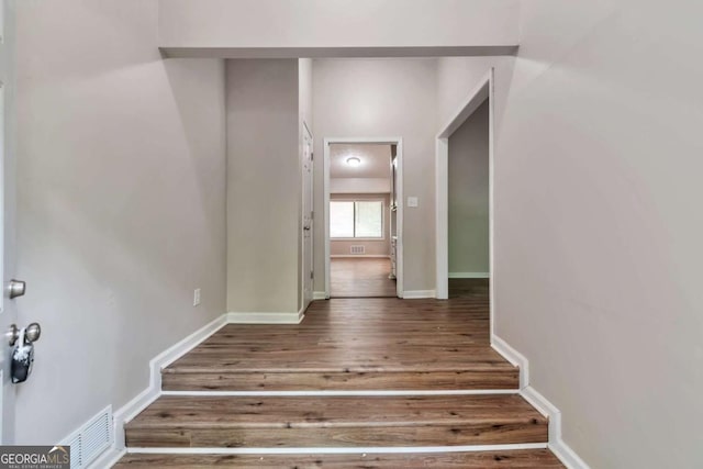5215 Mainstreet Park Dr, Stone Mountain, GA 30088 - stairs featuring wood finished floors