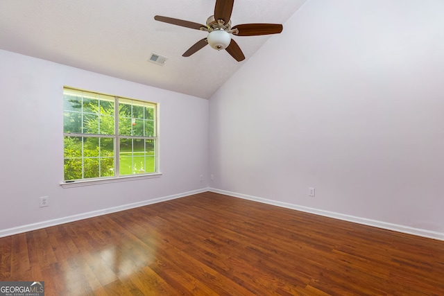 552 Caseys Xing, Winder, GA 30680 - spare room with vaulted ceiling, a ceiling fan, and wood finished floors