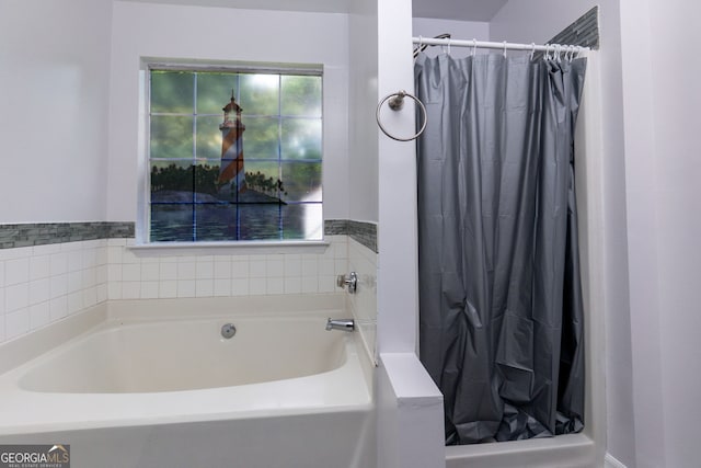 552 Caseys Xing, Winder, GA 30680 - bathroom with a garden tub and a stall shower