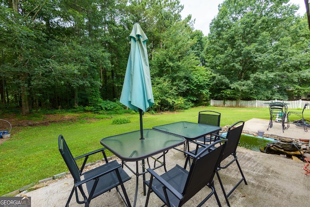 552 Caseys Xing, Winder, GA 30680 - view of patio featuring outdoor dining area