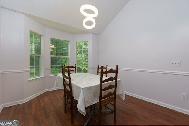 552 Caseys Xing, Winder, GA 30680 - dining space with wood finished floors, healthy amount of natural light, and vaulted ceiling