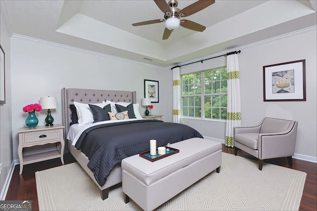552 Caseys Xing, Winder, GA 30680 - bedroom with a tray ceiling, wood finished floors, and ceiling fan