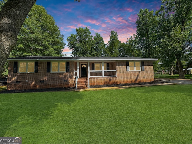 314 Pine St, Barnesville, GA 30204 - single story home featuring crawl space, a front lawn, a porch, and brick siding