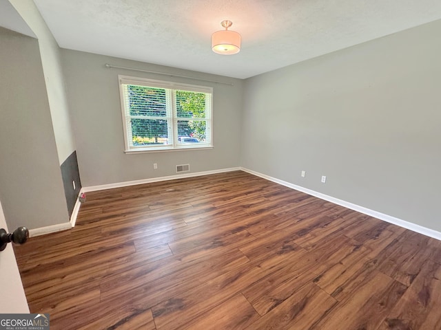 314 Pine St, Barnesville, GA 30204 - unfurnished room with wood finished floors and baseboards