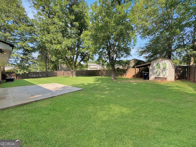 314 Pine St, Barnesville, GA 30204 - fenced backyard featuring a shed and a patio area