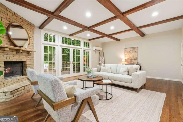5114 N Ivy Rd NE, Atlanta, GA 30342 - living room featuring coffered ceiling, a wall unit AC, wood finished floors, beam ceiling, and a fireplace