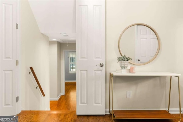 5114 N Ivy Rd NE, Atlanta, GA 30342 - hallway featuring attic access, an upstairs landing, and wood finished floors