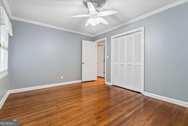 5114 N Ivy Rd NE, Atlanta, GA 30342 - unfurnished bedroom featuring wood finished floors, a closet, ornamental molding, and a ceiling fan