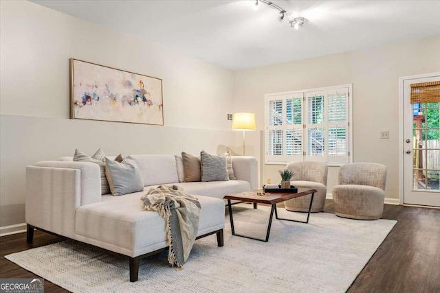 5114 N Ivy Rd NE, Atlanta, GA 30342 - living room with wood finished floors and track lighting