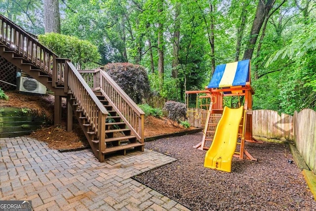 5114 N Ivy Rd NE, Atlanta, GA 30342 - view of jungle gym with stairs and a fenced backyard