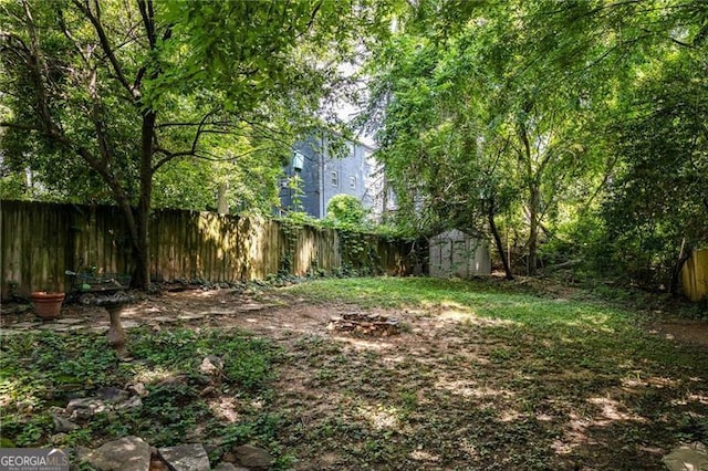 348 7th St NE, Atlanta, GA 30308 - fenced backyard with a storage shed