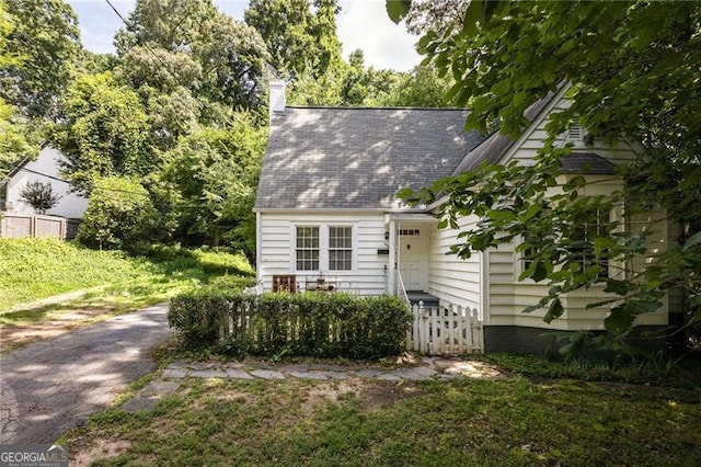 348 7th St NE, Atlanta, GA 30308 - view of front of property featuring a chimney and roof with shingles