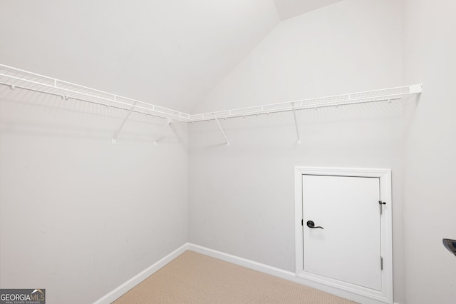 214 Misty View Dr, Canton, GA 30114 - walk in closet featuring vaulted ceiling and carpet