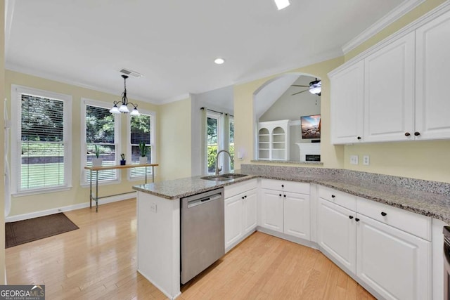 4206 Moccasin Trl, Woodstock, GA 30189 - kitchen with stainless steel dishwasher, ceiling fan, light wood-style floors, white cabinetry, and recessed lighting