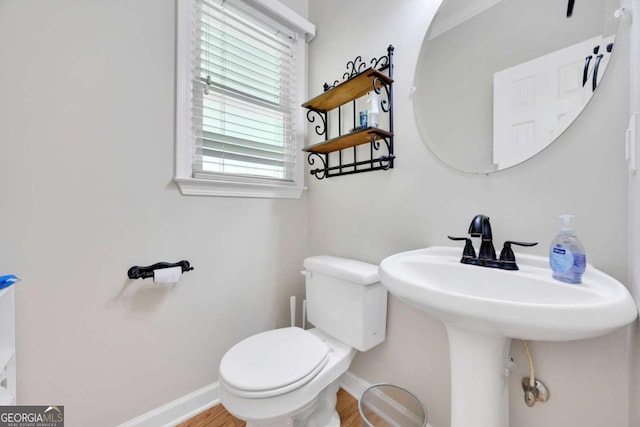 4206 Moccasin Trl, Woodstock, GA 30189 - half bathroom with toilet and wood finished floors