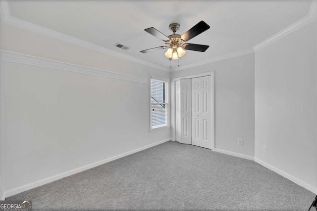 4206 Moccasin Trl, Woodstock, GA 30189 - carpeted empty room with ornamental molding and a ceiling fan