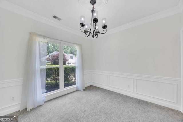 4206 Moccasin Trl, Woodstock, GA 30189 - carpeted empty room with a chandelier, ornamental molding, and a wainscoted wall