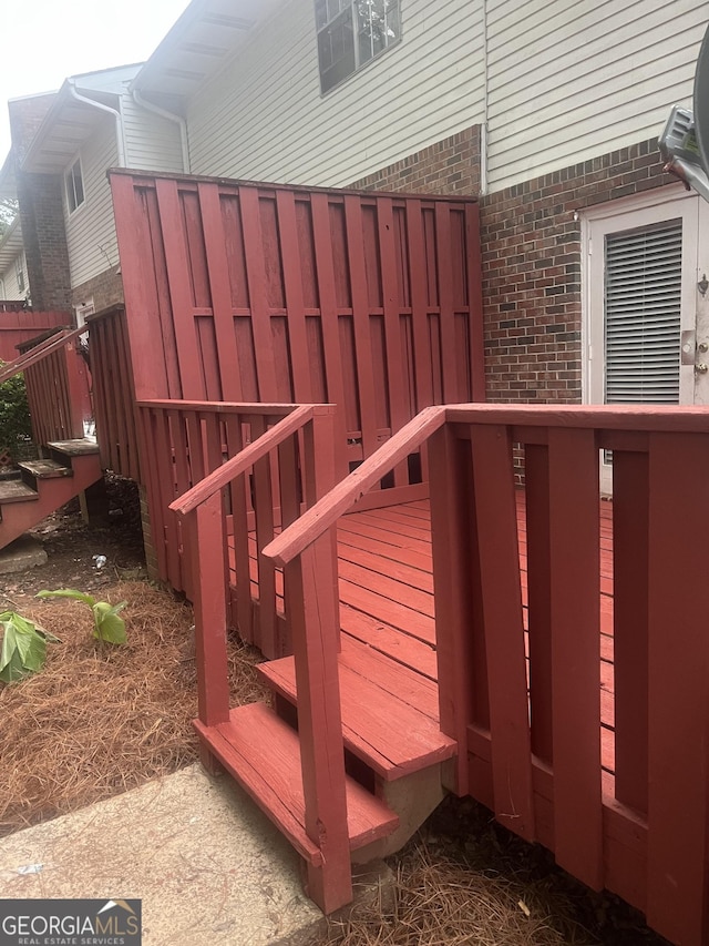 501 Carlton Rd # 3B, Palmetto, GA 30268 - wooden deck featuring stairs