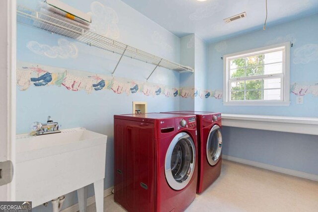 5003 Pacific Dunes Dr, Suwanee, GA 30024 - washroom with washing machine and clothes dryer and baseboards