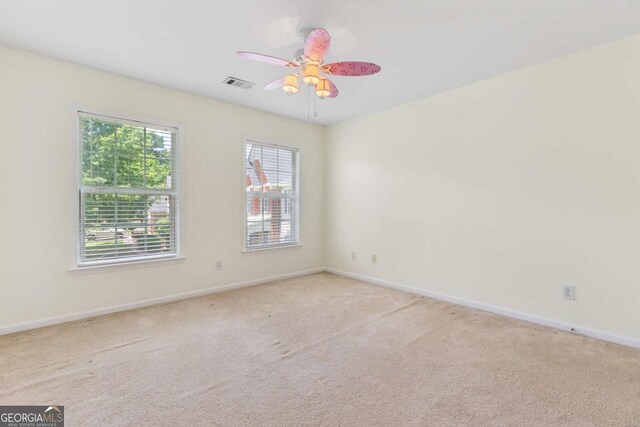 5003 Pacific Dunes Dr, Suwanee, GA 30024 - unfurnished room with carpet flooring and ceiling fan