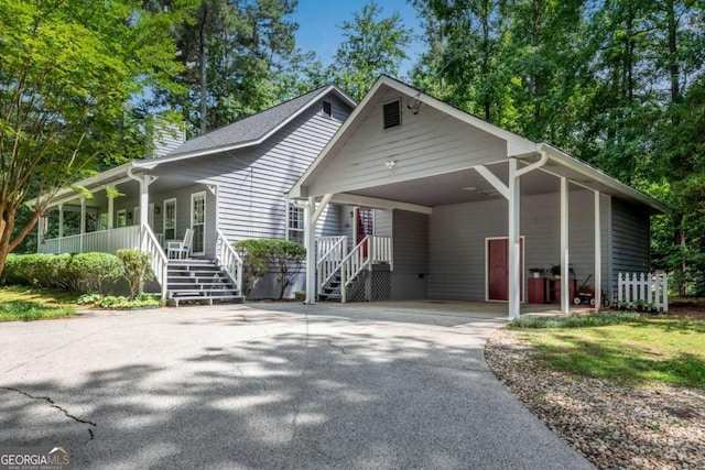 3754 Wyntuck Cir NW, Kennesaw, GA 30152 - view of front of house with concrete driveway, a porch, and stairs