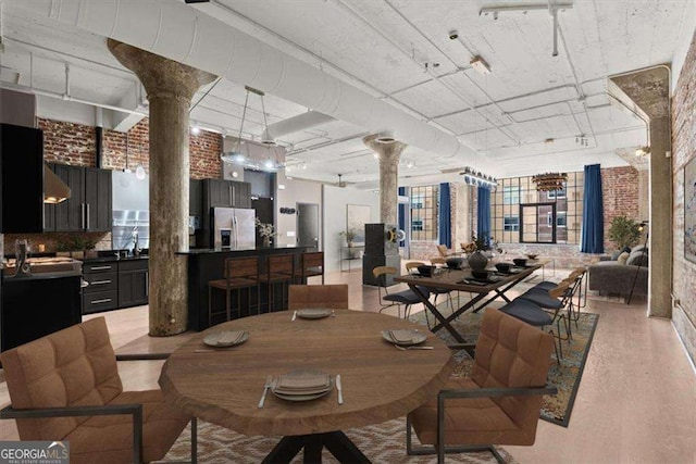 434 Marietta St NW Unit 301, Atlanta, GA 30313 - dining area featuring decorative columns