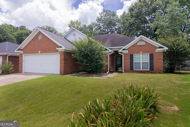 3030 Thornberry Cir, Phenix City, AL 36867 - view of front of property with brick siding, a garage, a front lawn, and driveway