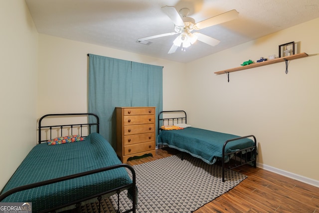 3030 Thornberry Cir, Phenix City, AL 36867 - bedroom featuring wood finished floors and ceiling fan