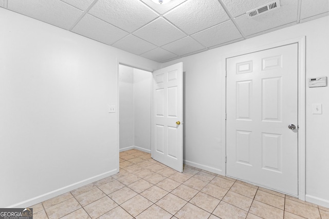 165 Lost Lake Trl, Villa Rica, GA 30180 - empty room with a drop ceiling and light tile patterned flooring