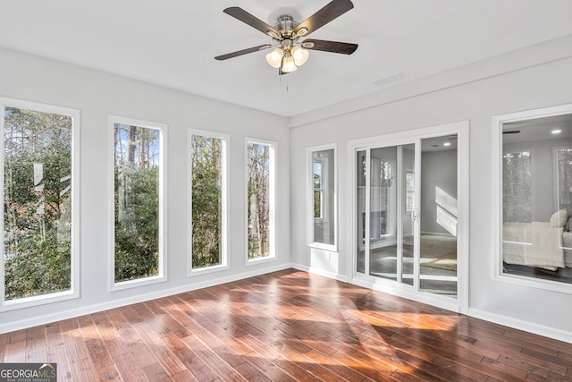 55 Summerhill Pl, Newnan, GA 30263 - unfurnished sunroom featuring wood finished floors and a wooden deck