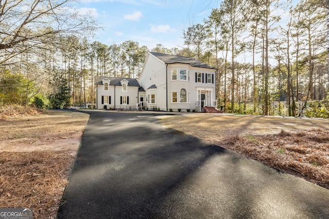 55 Summerhill Pl, Newnan, GA 30263 - french country inspired facade featuring driveway, stucco siding, and roof with shingles