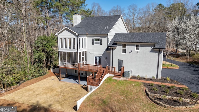 55 Summerhill Pl, Newnan, GA 30263 - rear view of property with roof with shingles, a chimney, a sunroom, and a deck