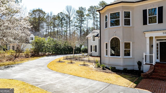 55 Summerhill Pl, Newnan, GA 30263 - view of side of property featuring stucco siding