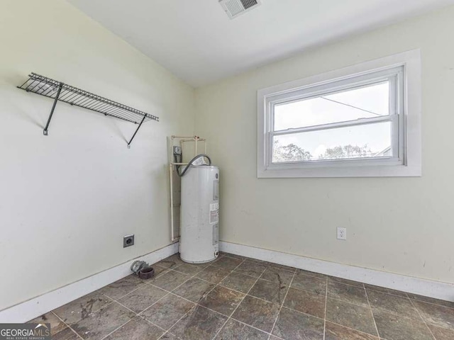 14367 Fincher Rd, Canton, GA 30114 - washroom featuring electric water heater and electric dryer hookup