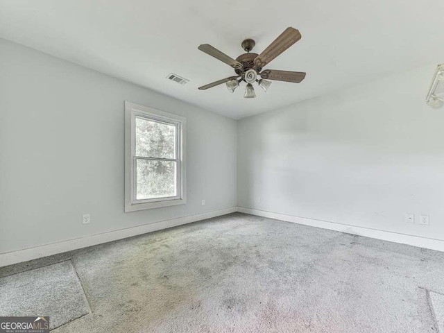 14367 Fincher Rd, Canton, GA 30114 - spare room with a ceiling fan and carpet floors
