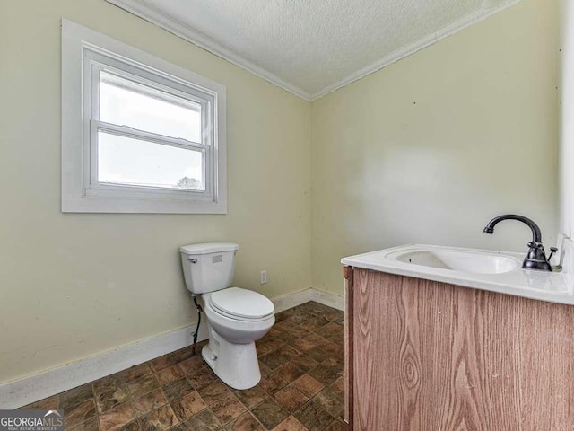 14367 Fincher Rd, Canton, GA 30114 - bathroom featuring stone finish flooring, ornamental molding, a textured ceiling, and vanity